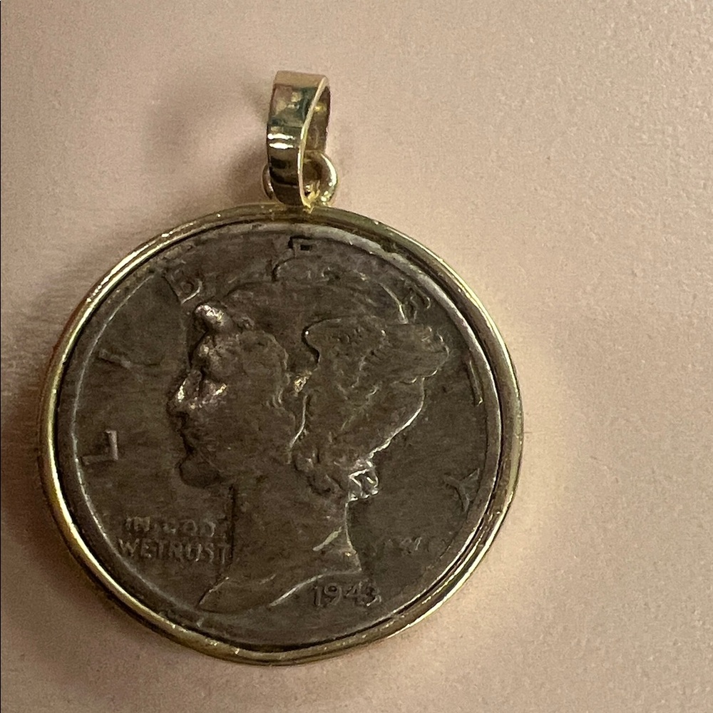 Gold and Silver Coin Pendant. So pretty and shows sophistication.